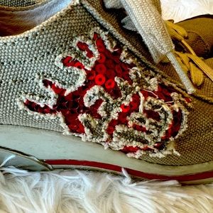 Truly unique wedge sneakers with red sequins!